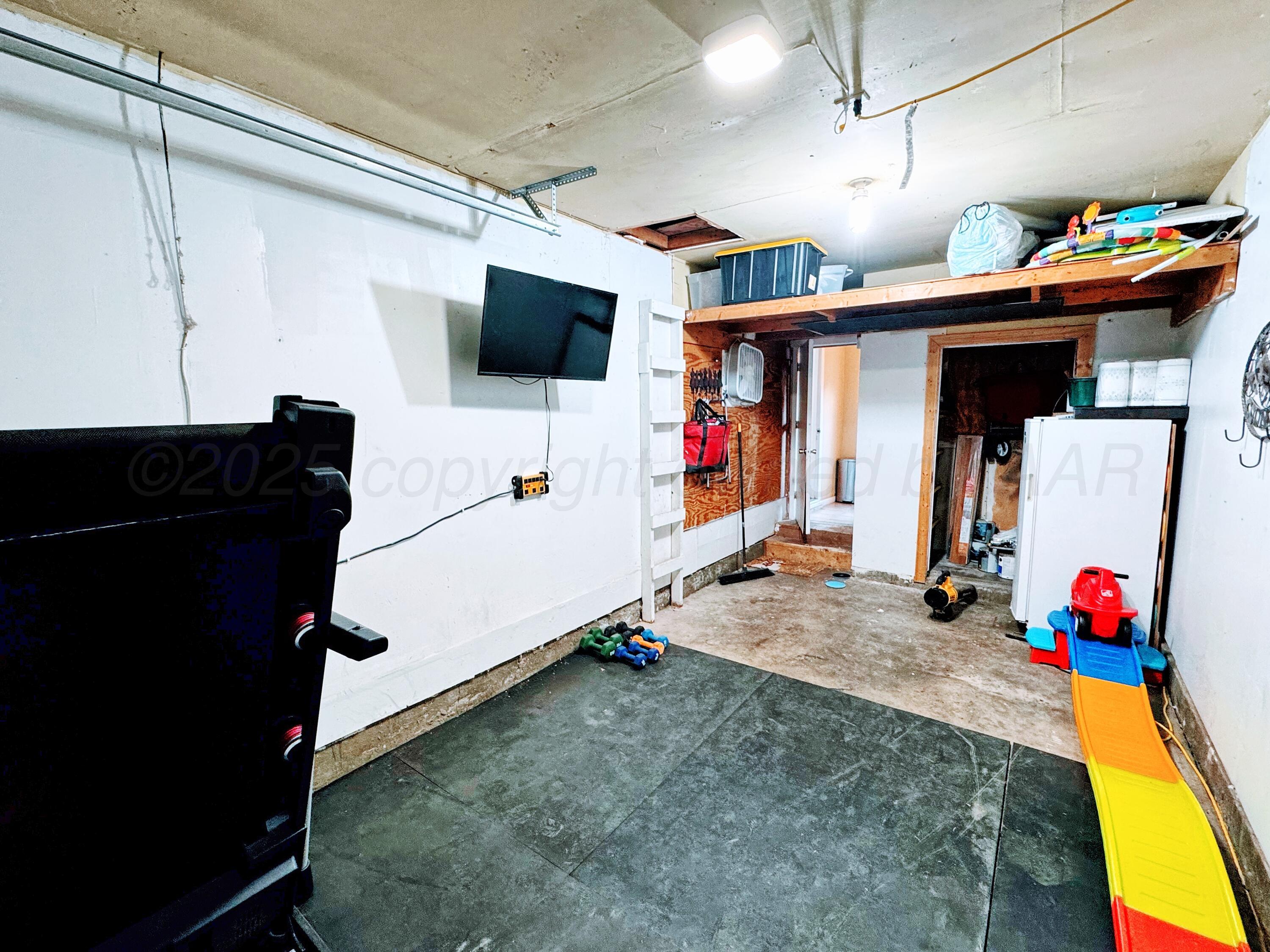 2006 Drake Drive Perryton, TX 79070 - Photo 15 of 17 a storage utility room with two washing machine