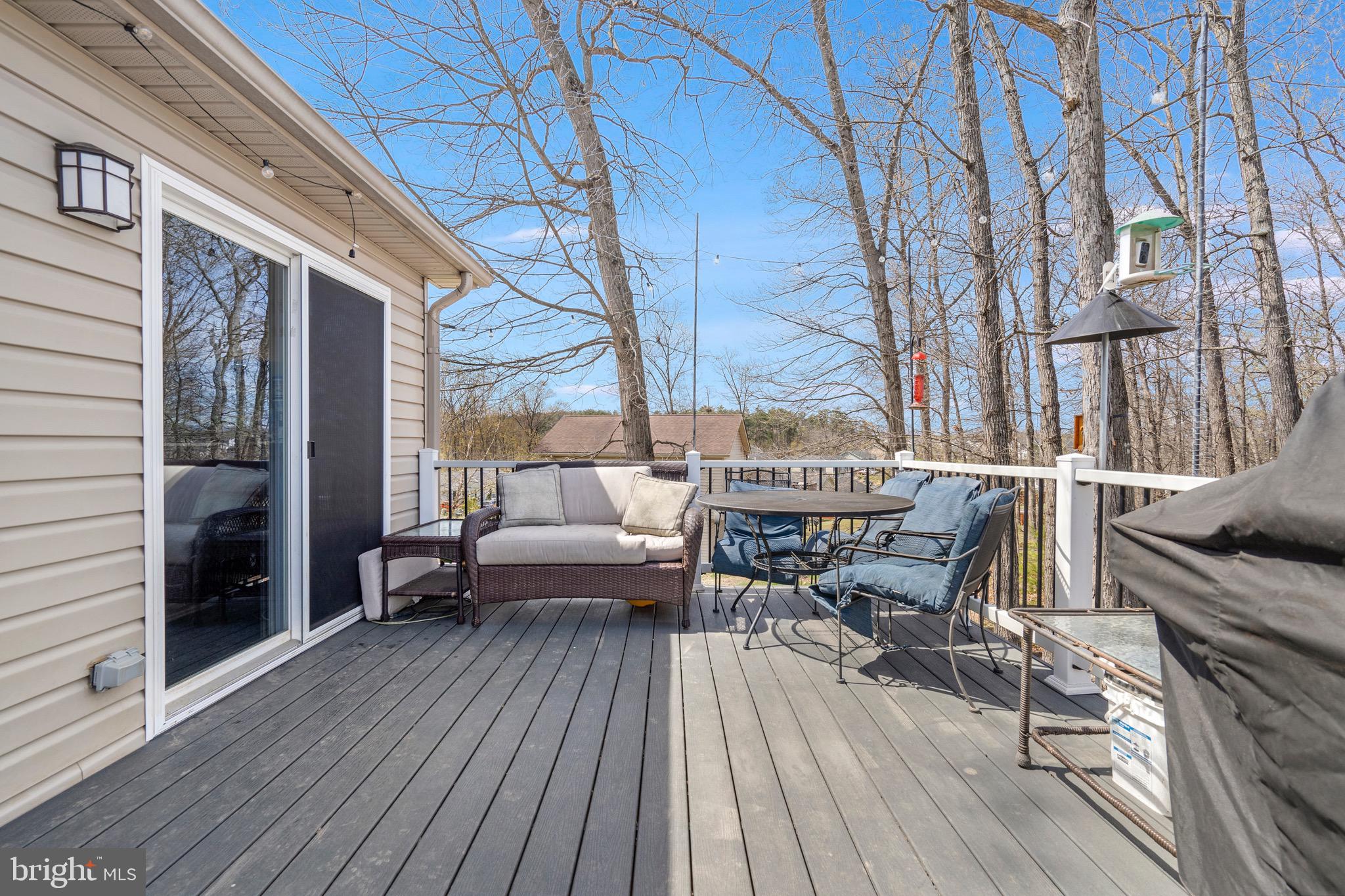 183 Basin Drive Inwood, WV 25428 - Photo 12 of 27 a view of roof deck with patio