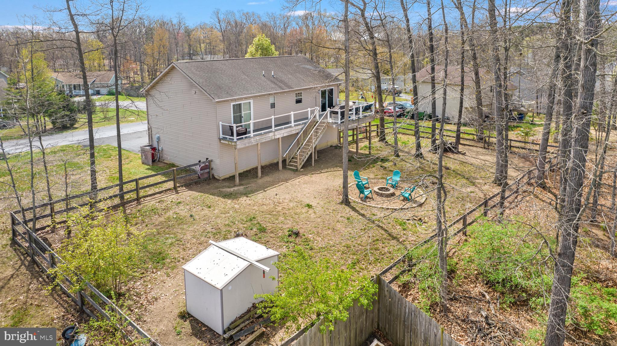 183 Basin Drive Inwood, WV 25428 - Photo 2 of 27 a view of a house with a yard