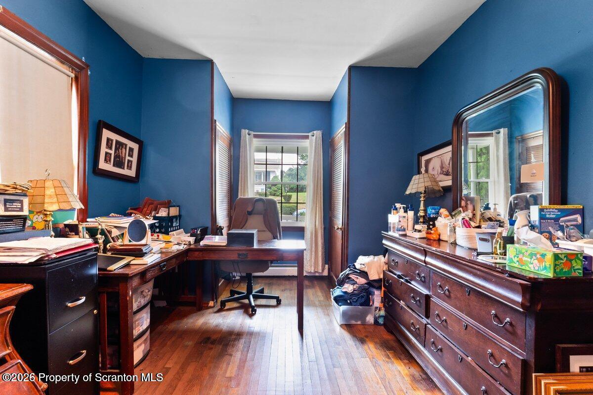 1411 Watson Street Scranton, PA 18504 - Photo 15 of 26 a room with wooden floor and furniture