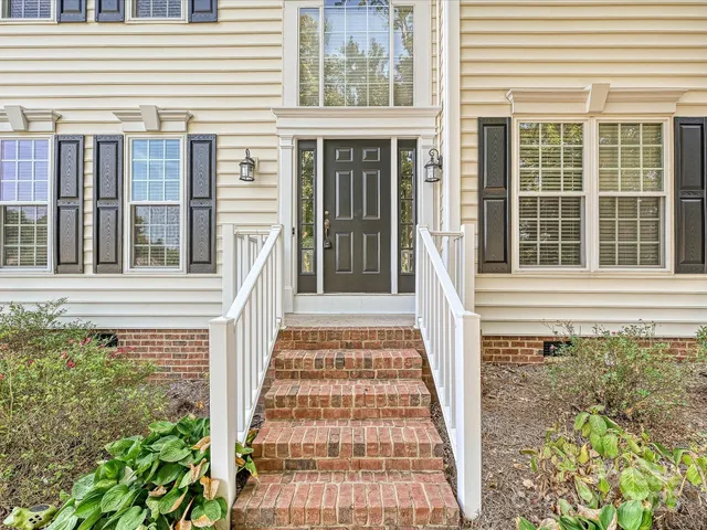 front view of a house and a yard