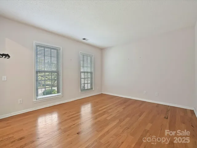 a view of a chandelier in an empty room