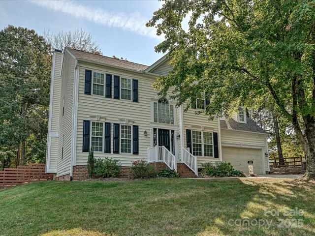 a backyard of a house with lots of green space