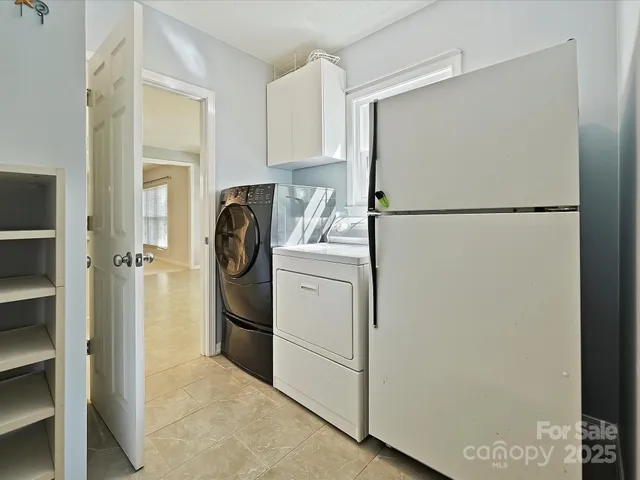 a view of a hallway with workspace