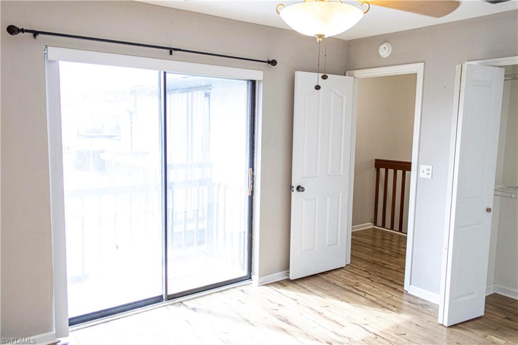 707 Hoover Dike Road Clewiston, FL 33440 - Photo 27 of 39 a view of a small space with wooden floor and a window