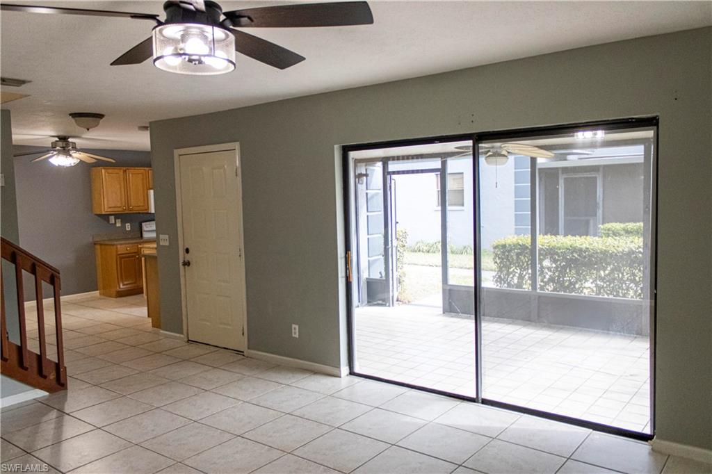 707 Hoover Dike Road Clewiston, FL 33440 - Photo 5 of 39 a view of a hallway with a chandelier