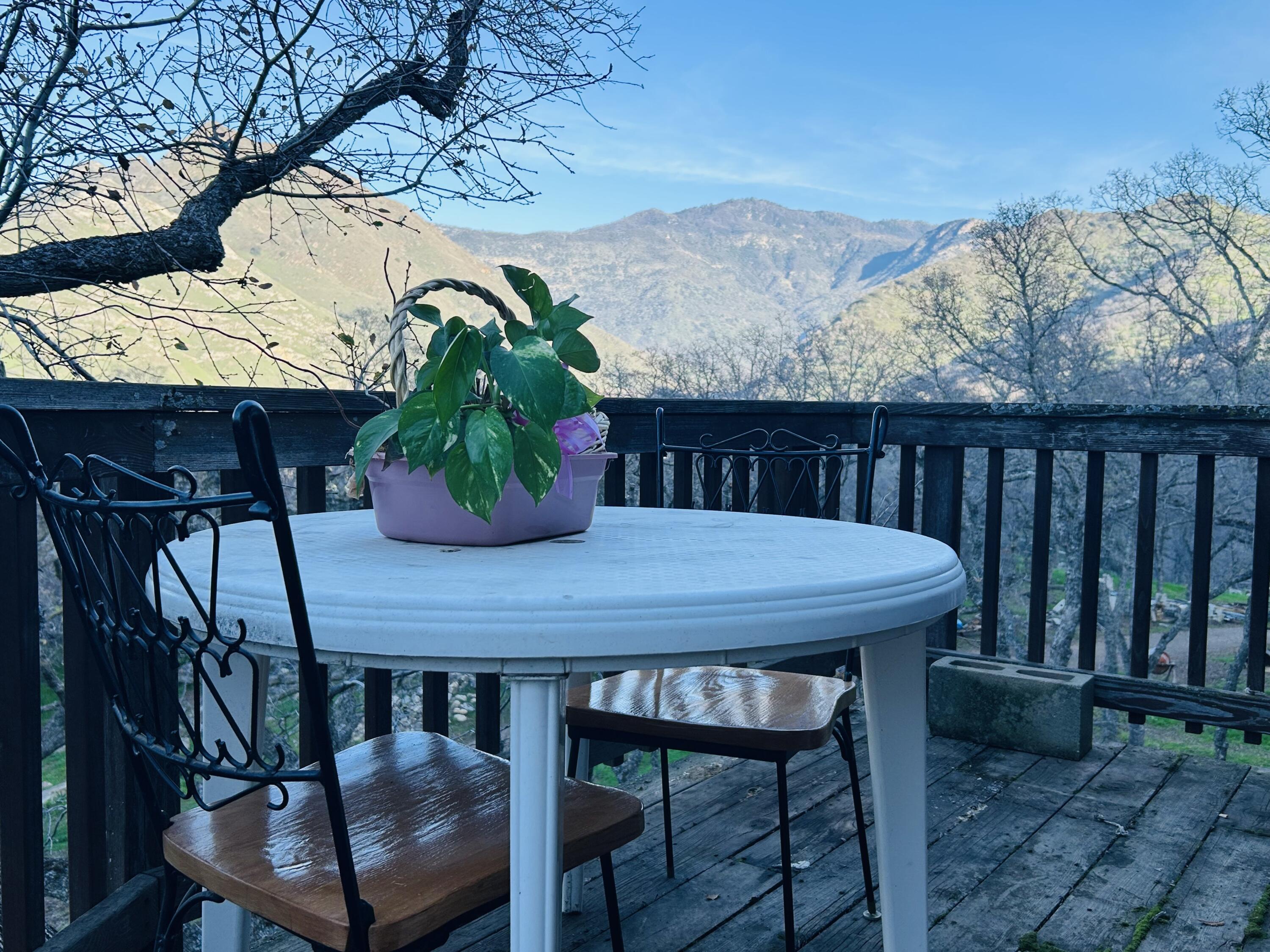 40838 Oak Ridge Drive Three Rivers, CA 93271 - Photo 9 of 51 a view of a chairs and table in the patio