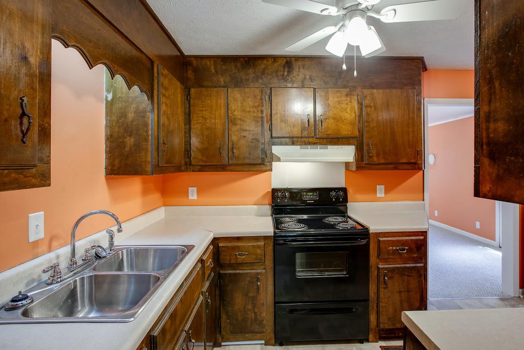 2422 Grays Bend Road Centerville, TN 37033 - Photo 11 of 30 New sinks, washer & dryer hookups in the kitchen