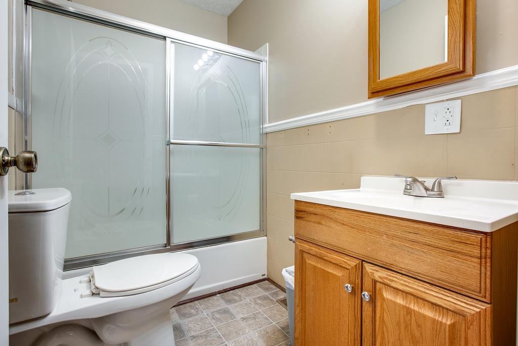2422 Grays Bend Road Centerville, TN 37033 - Photo 17 of 30 New vanity, toilet, tub and shower combo.