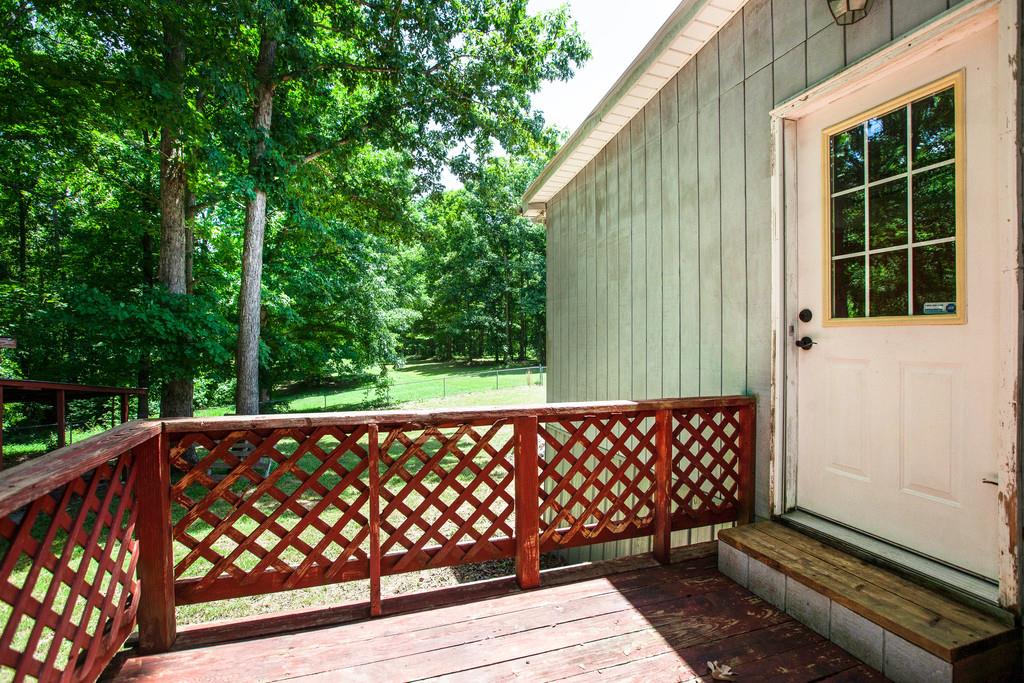 2422 Grays Bend Road Centerville, TN 37033 - Photo 22 of 30 Step outside to the deck which is private and spacious.