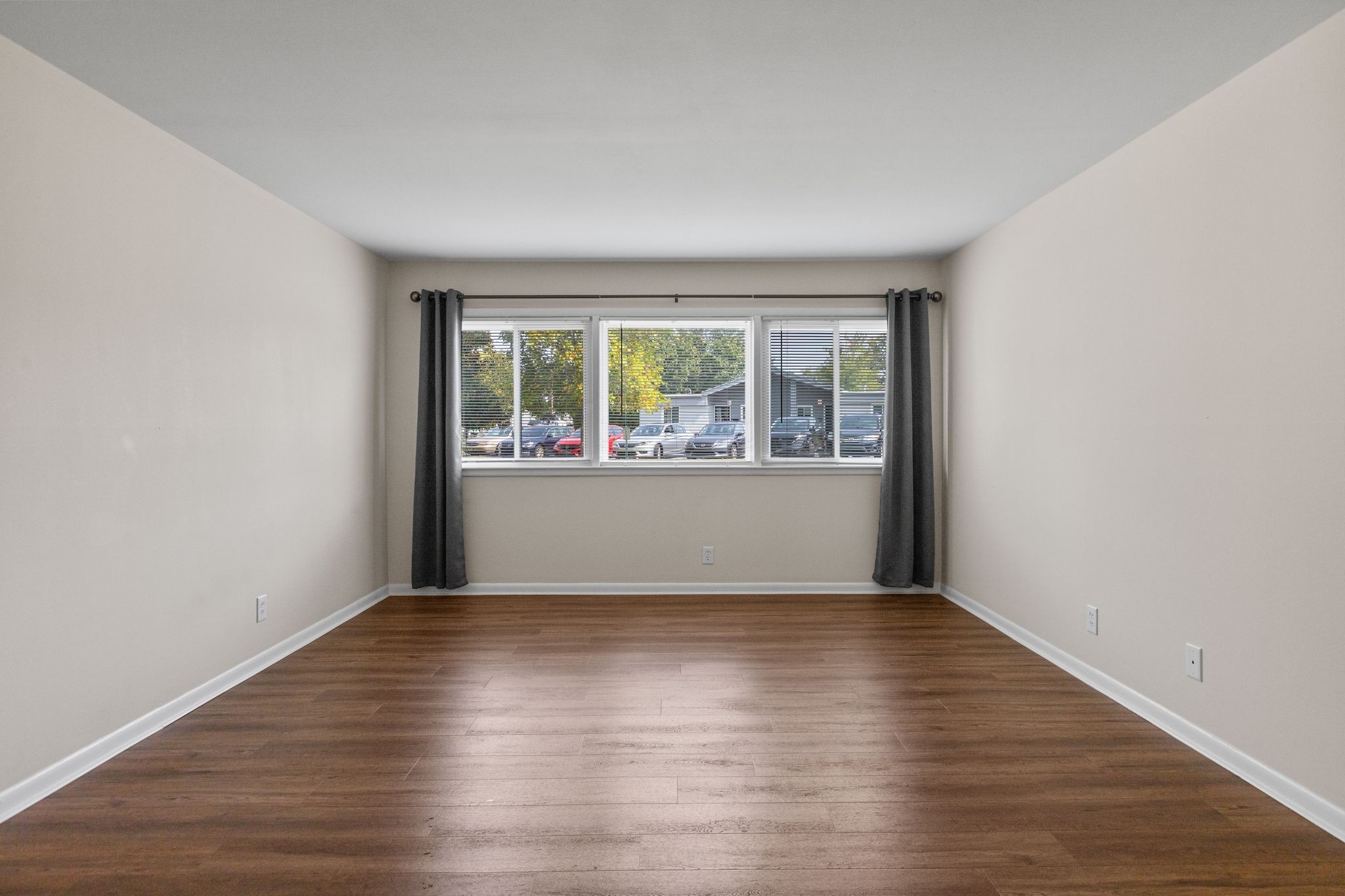 1900 Richard Jones Road, Unit R1 Nashville, TN 37215 - Photo 5 of 29 a view of empty room with wooden floor and fan