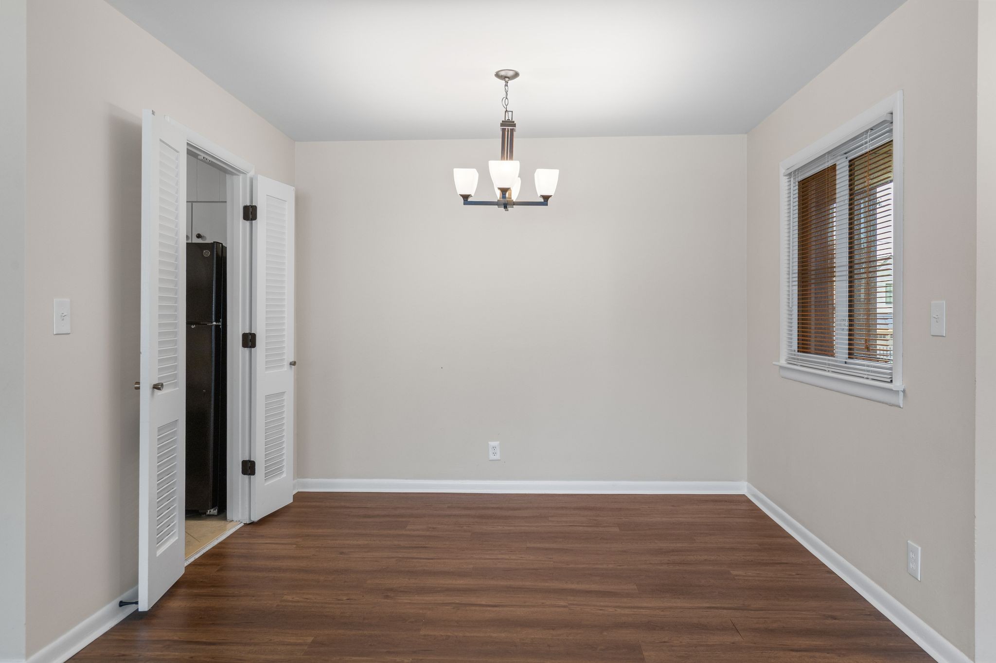 1900 Richard Jones Road, Unit R1 Nashville, TN 37215 - Photo 8 of 29 wooden floor in an empty room with a window
