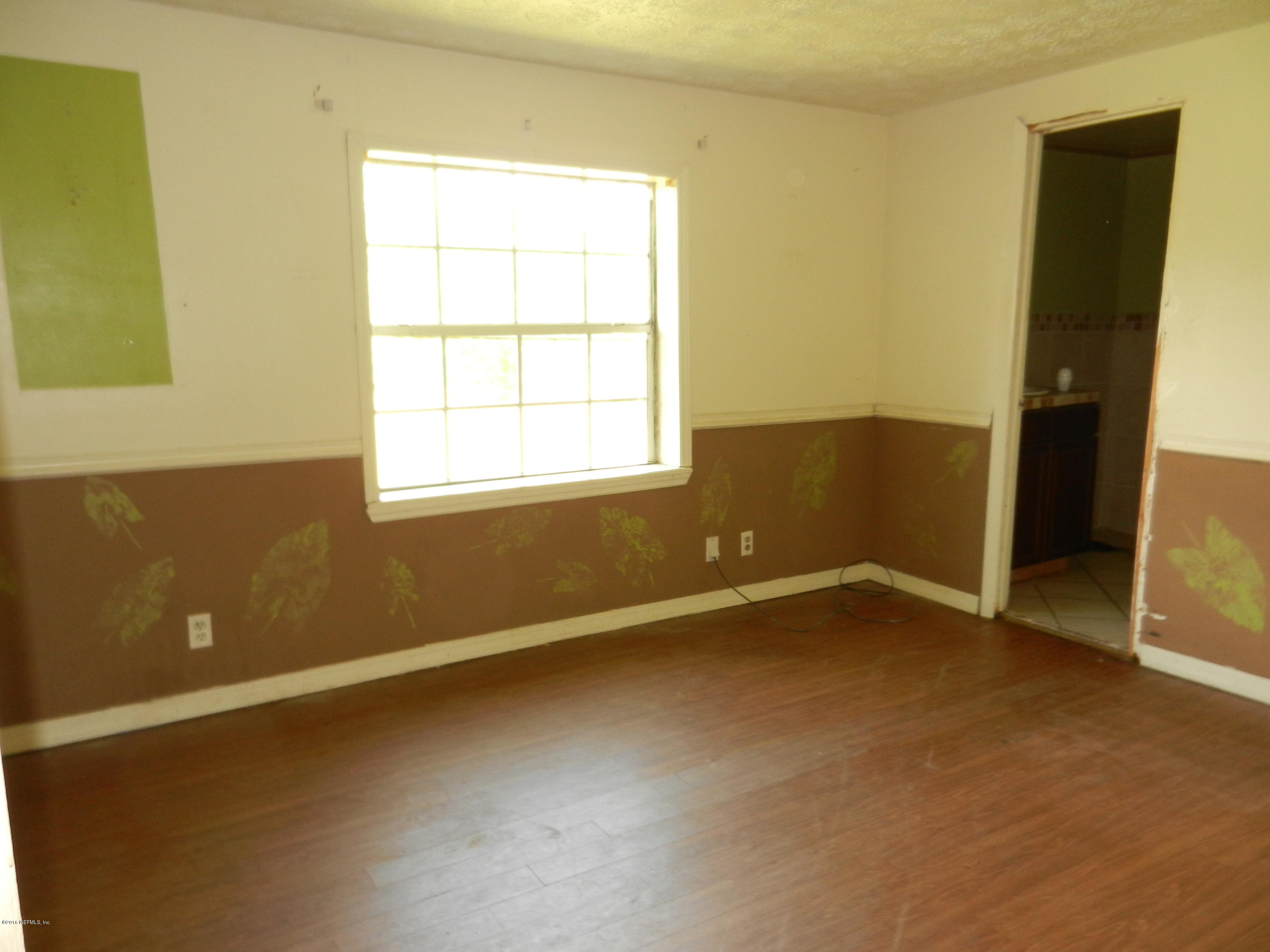 54537 Marlee Road Callahan, FL 32011 - Photo 13 of 17 an empty room with a window