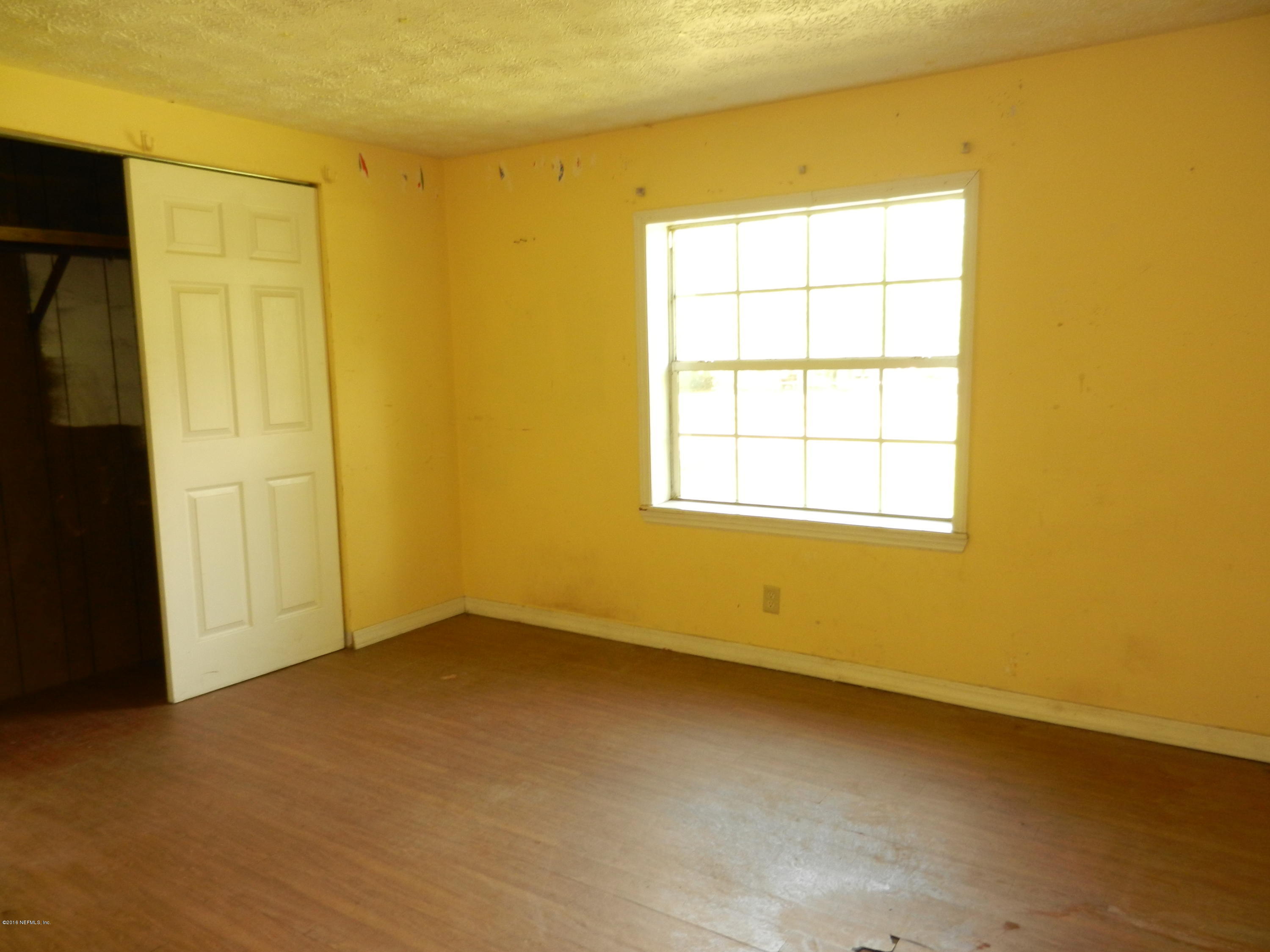 54537 Marlee Road Callahan, FL 32011 - Photo 14 of 17 an empty room with a window