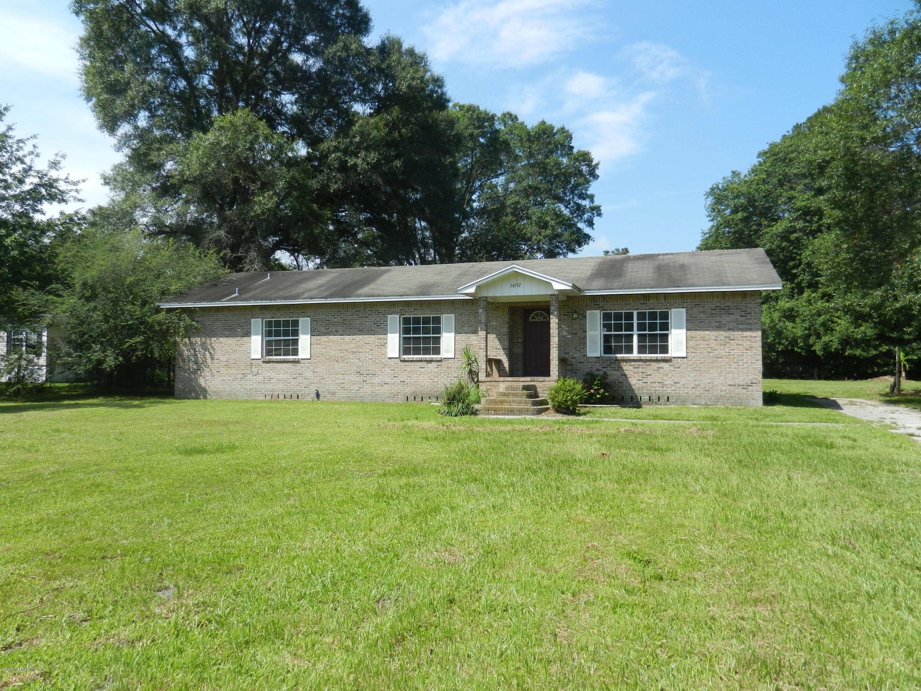 54537 Marlee Road Callahan, FL 32011 - Photo 15 of 17 a view of a house with a backyard