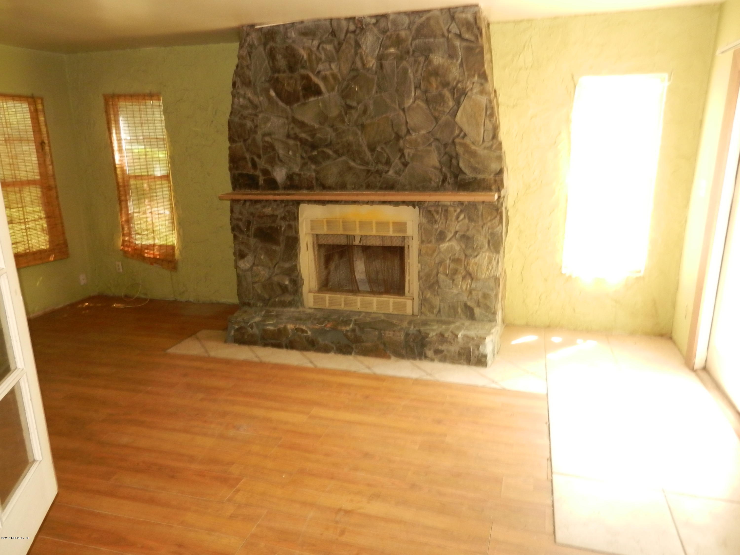 54537 Marlee Road Callahan, FL 32011 - Photo 3 of 17 a view of empty room with windows