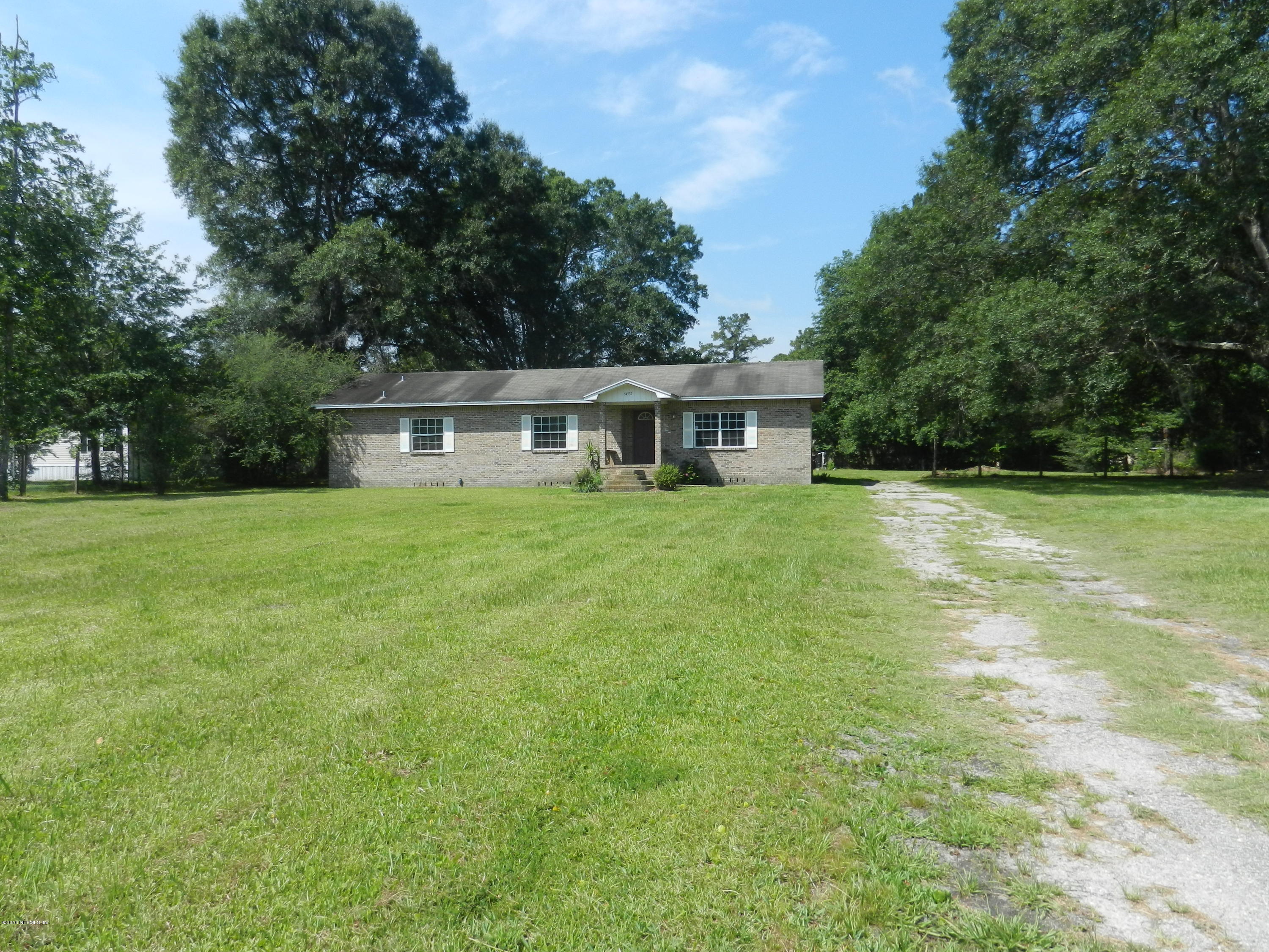 54537 Marlee Road Callahan, FL 32011 - Photo 6 of 17 a view of a house with a big yard