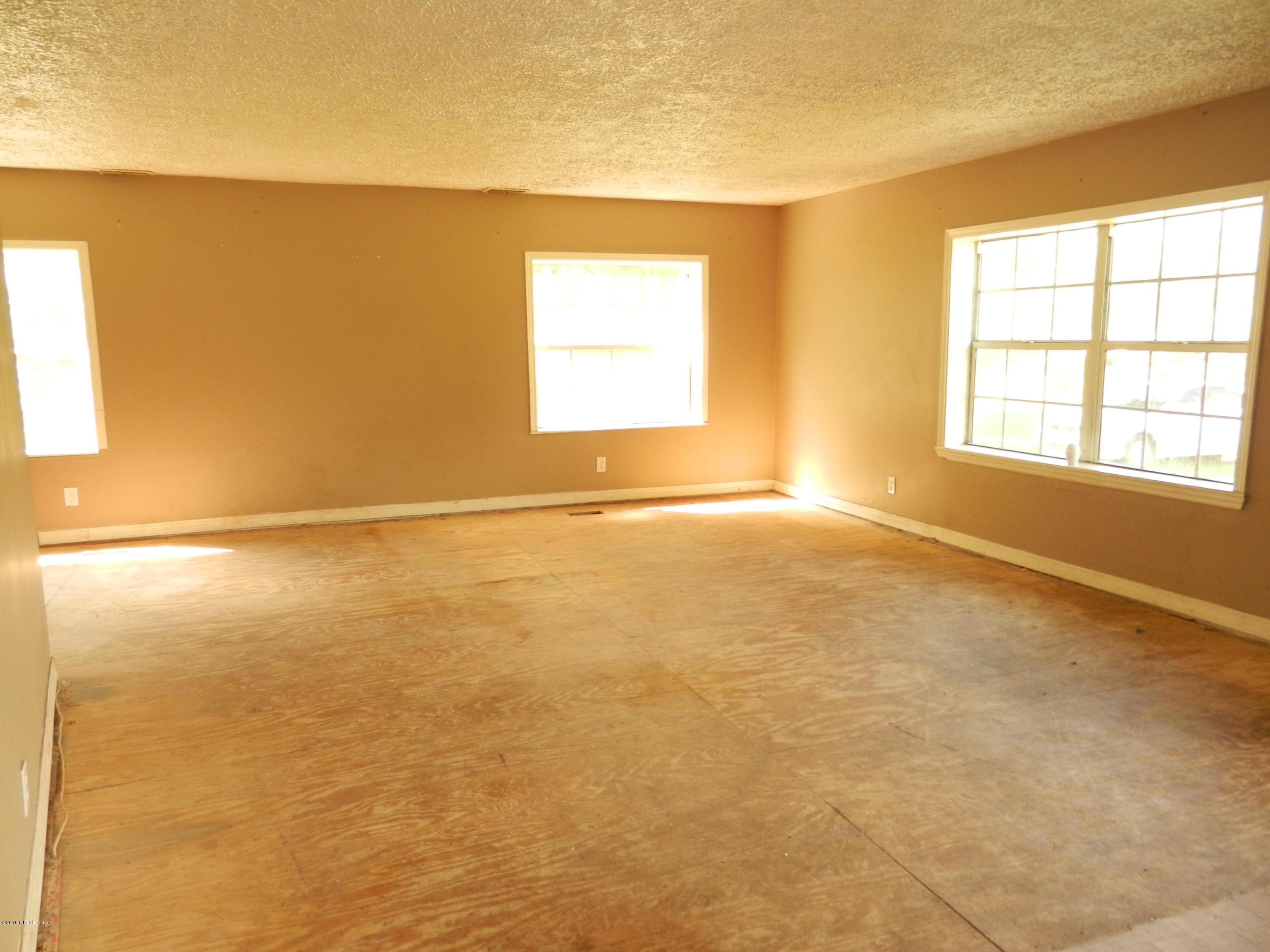 54537 Marlee Road Callahan, FL 32011 - Photo 10 of 17 a view of an empty room with a window