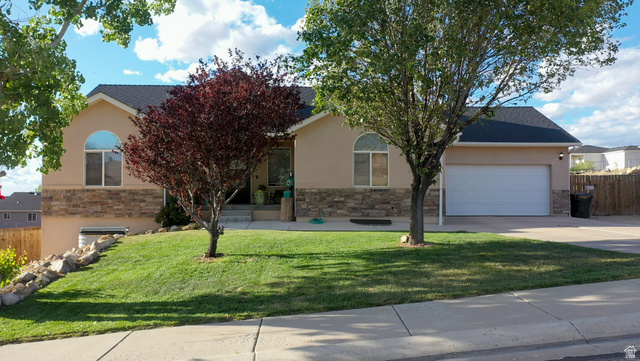 1797 Sunset Road Enoch, UT 84721 - Photo 3 of 80 Contemporary stucco exterior with a stone veneer accent