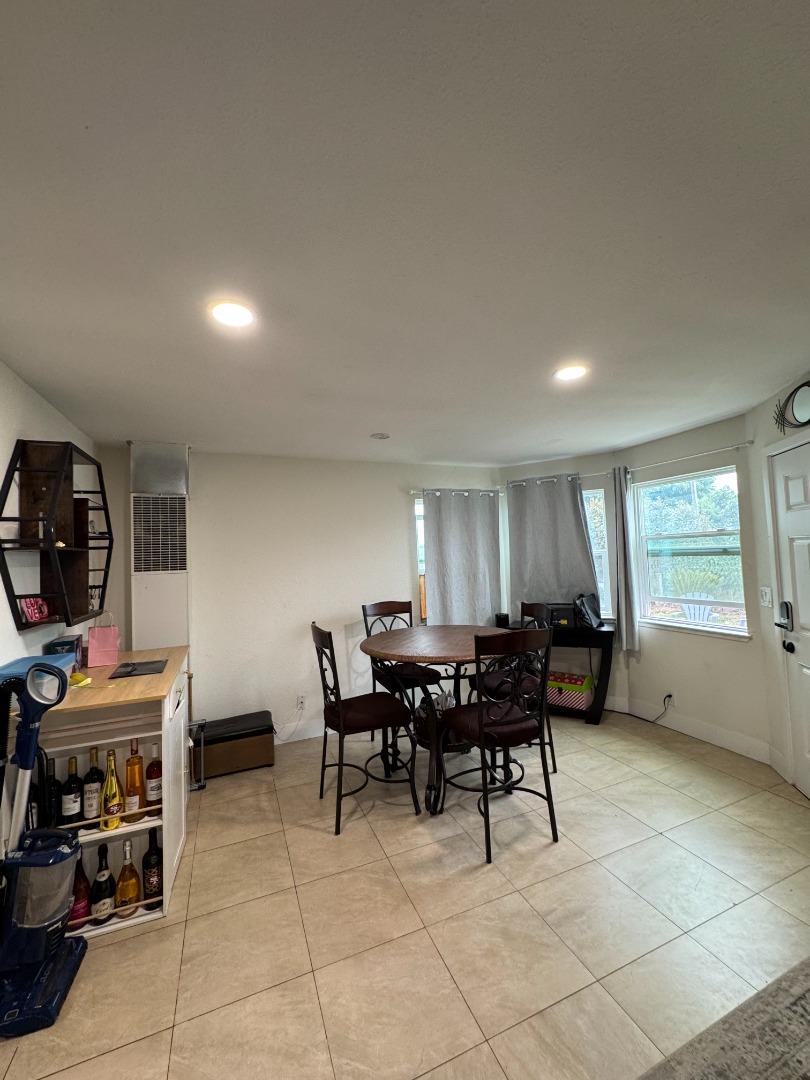 2712 Ferguson Road Gilroy, CA 95020 - Photo 29 of 60 a view of a dining room with furniture and chandelier