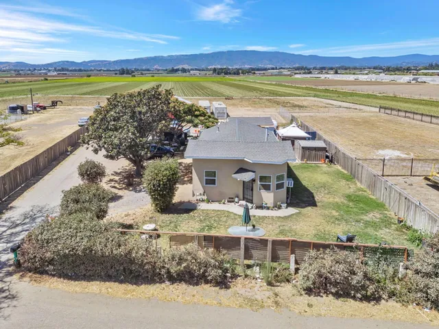 a view of a house with a ocean beach