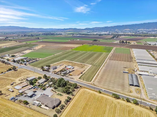 an aerial view of a house with outdoor space
