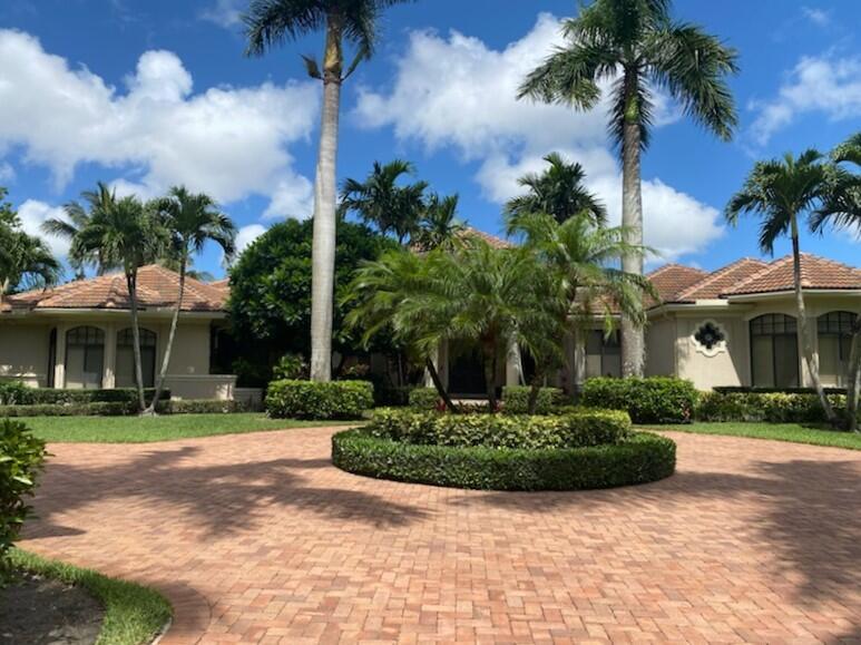 8158 Native Dancer Road East Palm Beach Gardens, FL 33418 - Photo 23 of 47 Front of the home
