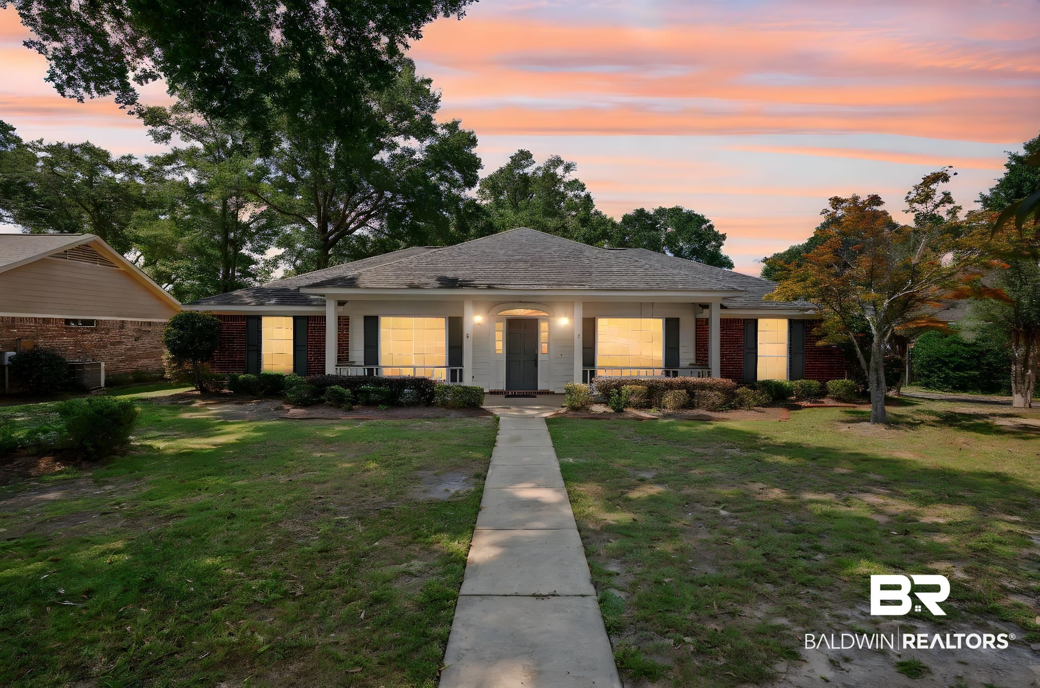 1340 Wellsley Court Mobile, AL 36695 - Photo 3 of 37 View of front of property with a porch, a yard, and brick siding