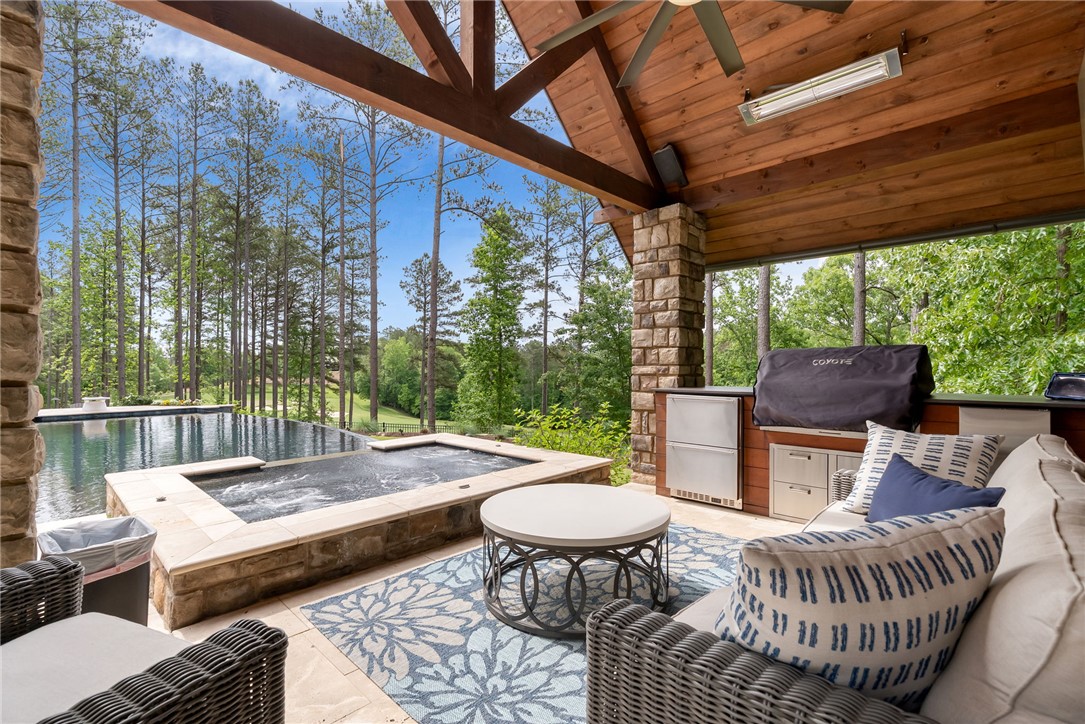 119 Drewberry Lane Sunset, SC 29685 - Photo 24 of 42 This serene outdoor living area offers tranquil views of the surrounding natural landscape.