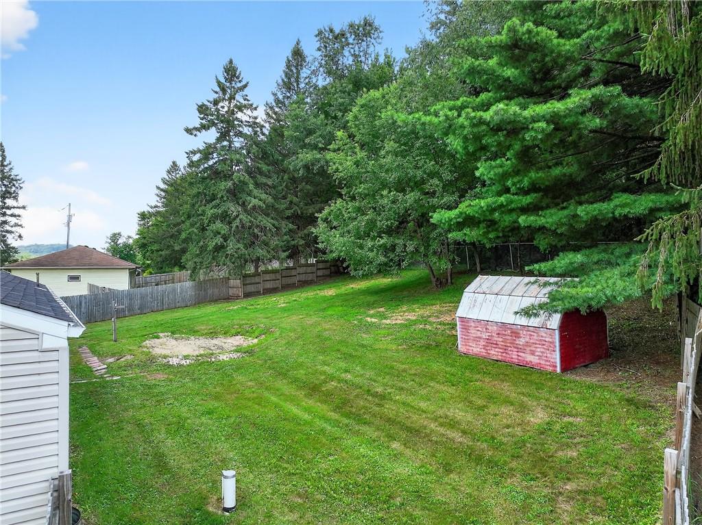 201 Glen Eden Road Rochester, PA 15074 - Photo 30 of 34 a view of a wooden house with a backyard