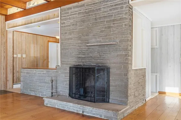 a view of front door of house with stairs