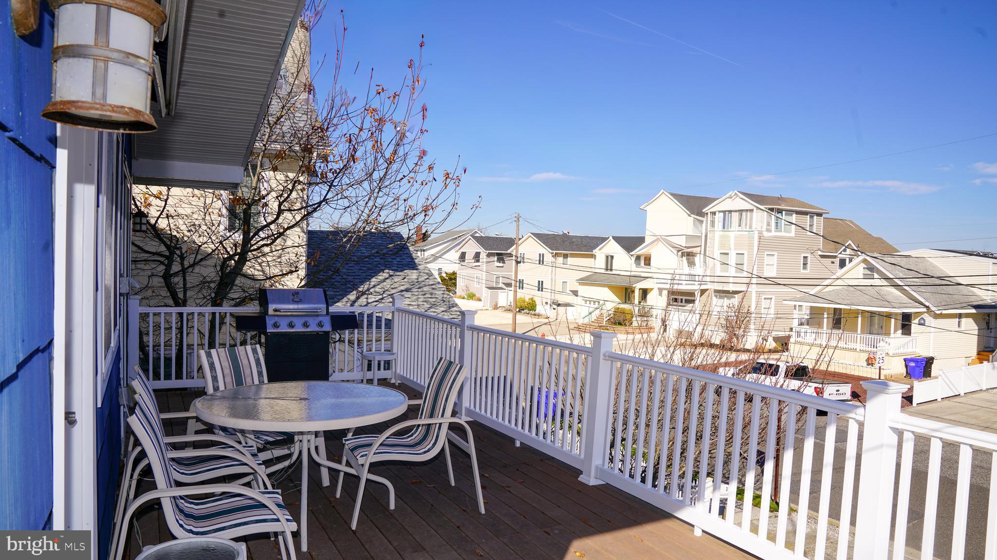 386 24th Street Avalon, NJ 08202 - Photo 27 of 32 a view of a chairs and table in the balcony