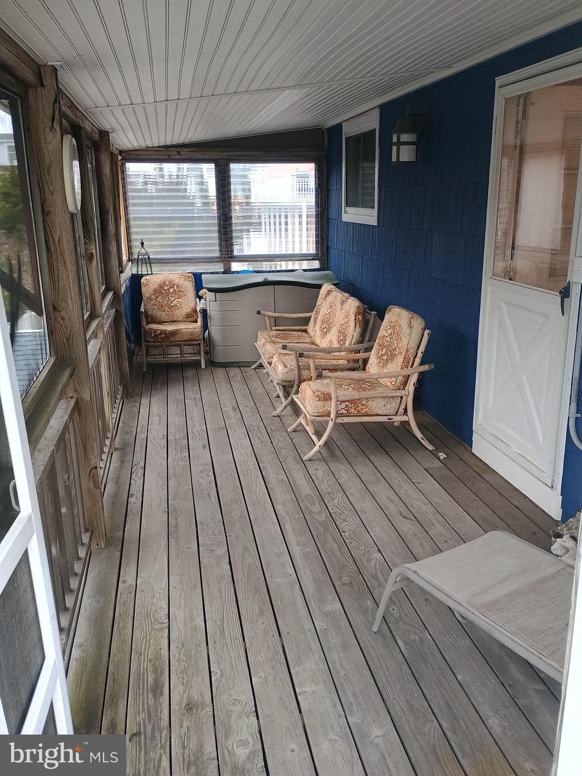 386 24th Street Avalon, NJ 08202 - Photo 30 of 32 a living room with furniture and a fireplace