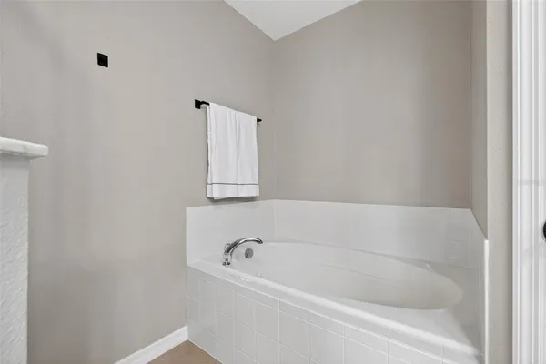 a bathroom with a bathtub