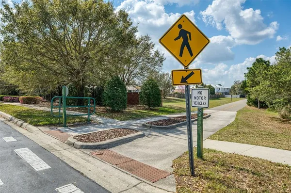 a sign that is on the side of a road