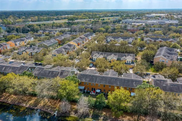 an aerial view of a house with a garden