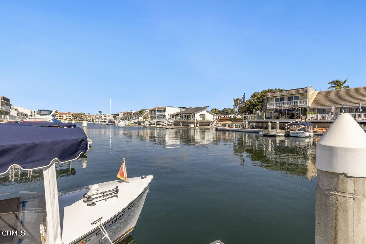 4612 Falkirk Bay Oxnard, CA 93035 - Photo 17 of 39 a view of a lake with tall buildings