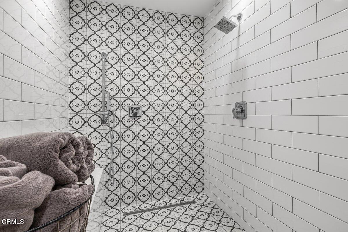 4612 Falkirk Bay Oxnard, CA 93035 - Photo 22 of 39 a bathroom with a sink and a shower