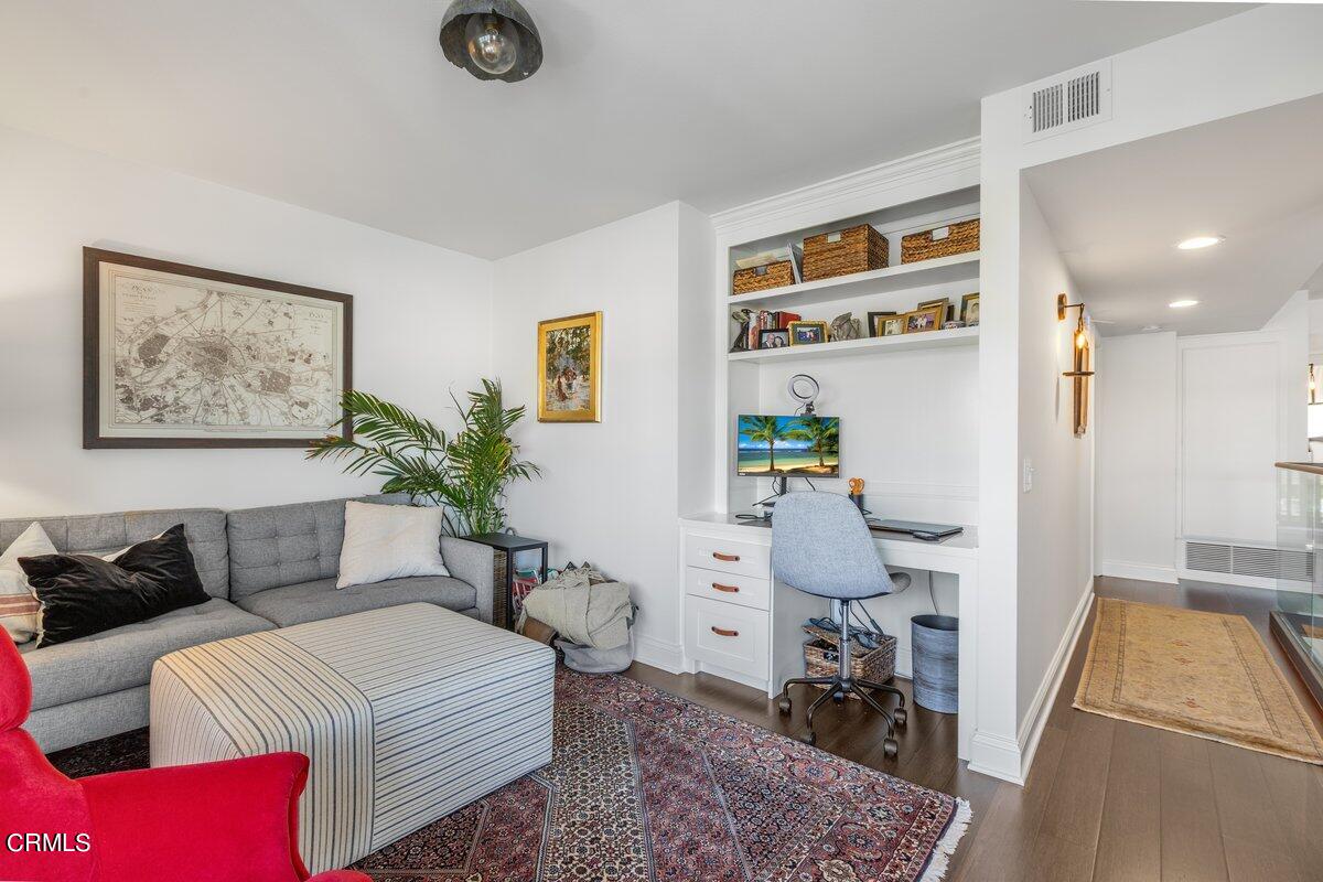 4612 Falkirk Bay Oxnard, CA 93035 - Photo 28 of 39 a living room with furniture and wooden floor