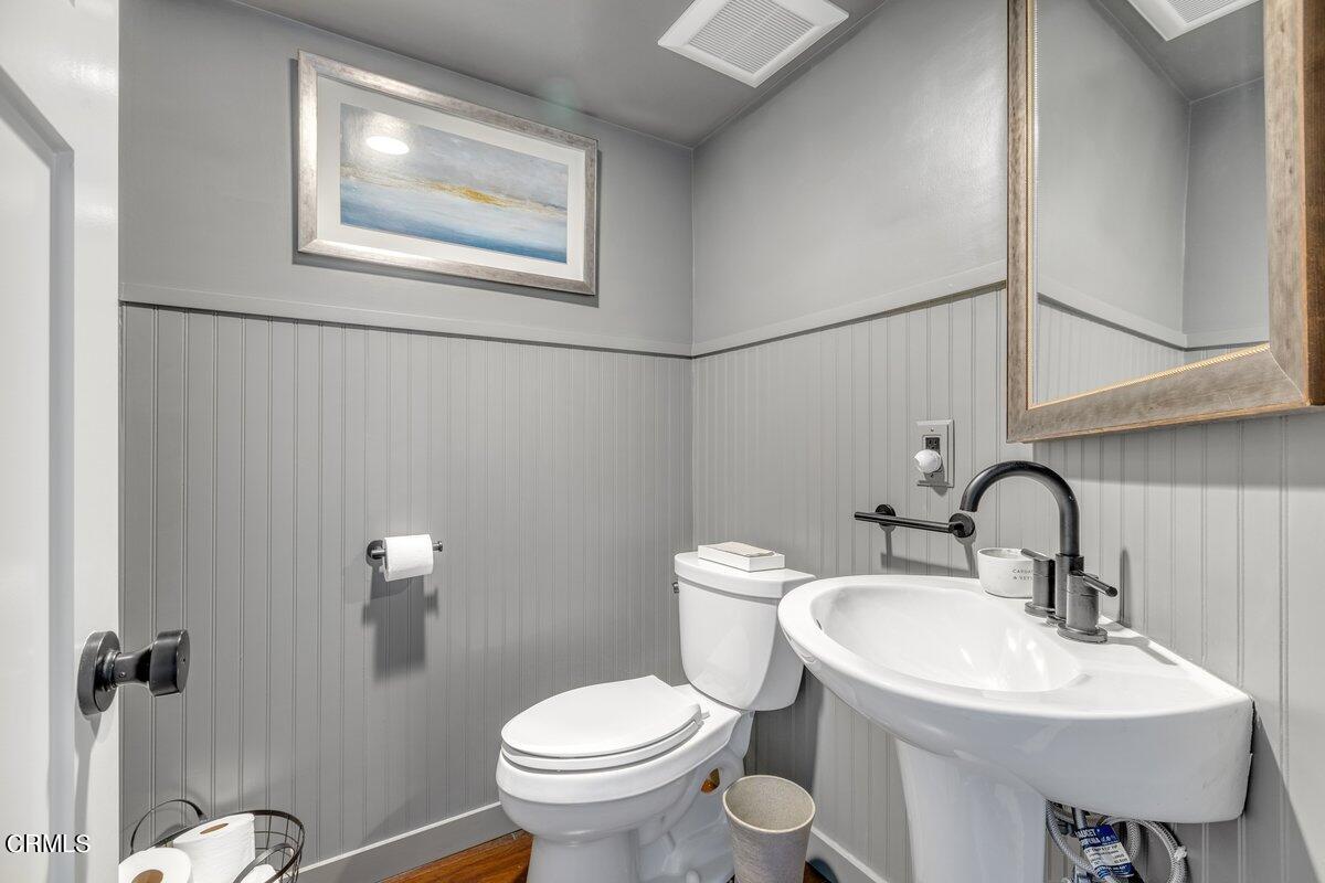 4612 Falkirk Bay Oxnard, CA 93035 - Photo 34 of 39 a bathroom with a sink mirror and toilet