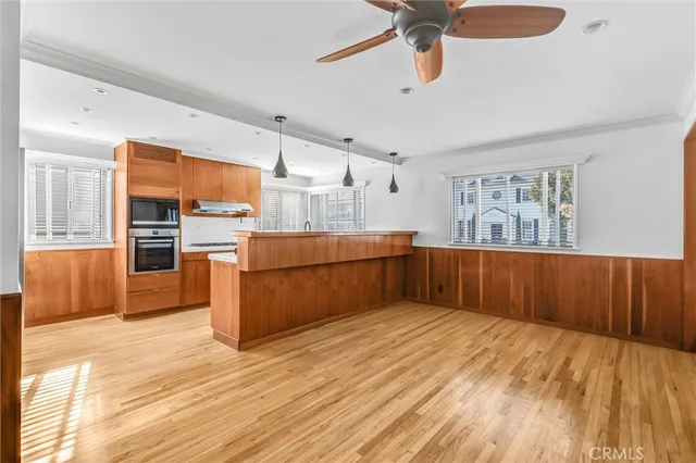 a view of a livingroom with wooden floor