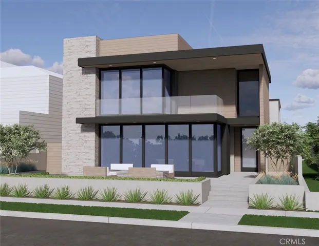 a front view of a house with a garden and garage