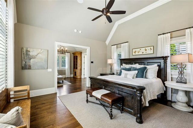 a view of a house with a yard patio and swimming pool