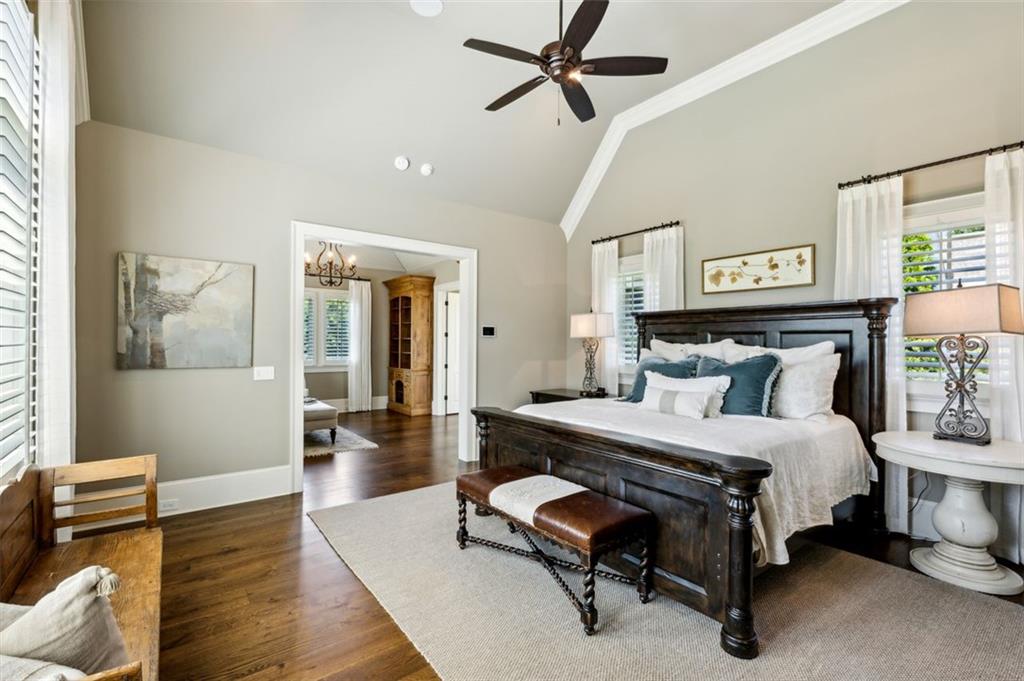 1990 Elder Mill Road Watkinsville, GA 30677 - Photo 13 of 61 a bedroom with a bed and wooden floor