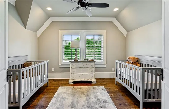 a balcony with furniture and a potted plant