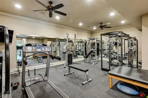 a swimming pool with outdoor seating and yard