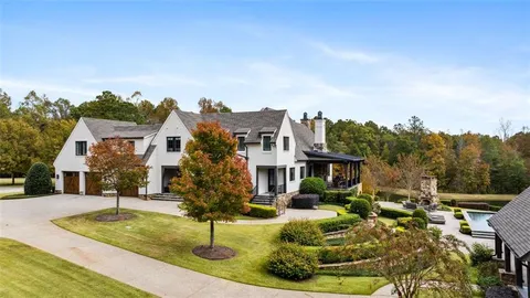 a terrace with outdoor seating and city view