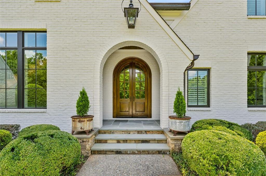1990 Elder Mill Road Watkinsville, GA 30677 - Photo 5 of 61 a front view of a house with garden