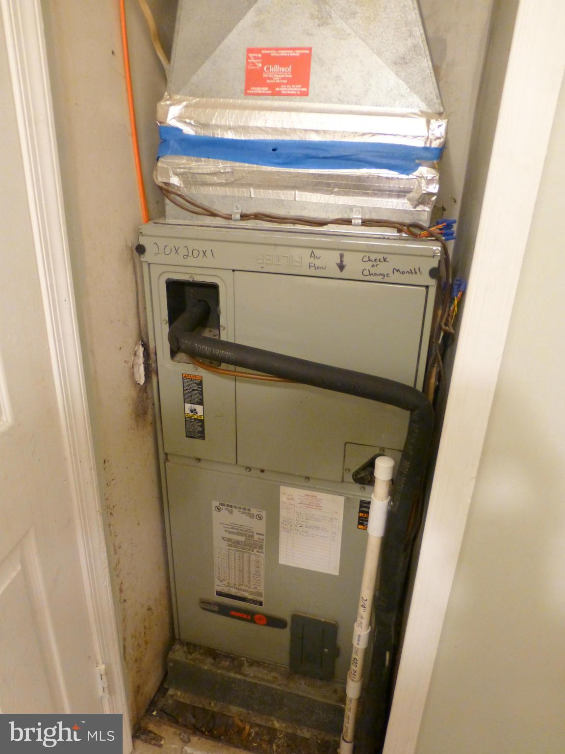 295 Whitaker Road Pasadena, MD 21122 - Photo 15 of 20 HEAT PUMP UNIT ACCESS IN BATHROOM CLOSET