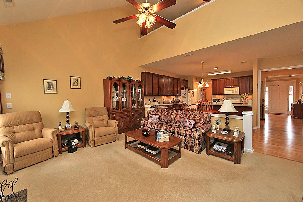 5333 Brandy Bay Road Raleigh, NC 27613 - Photo 8 of 20 Another view of the living room looking into the kitchen. Living Room